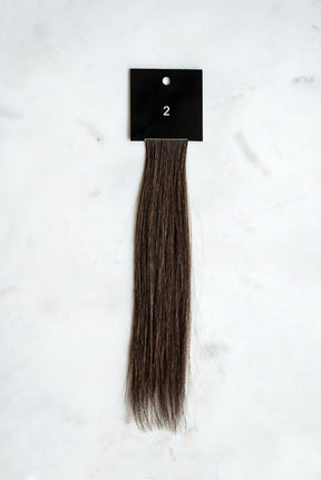 2 narrow edge hair extension above view